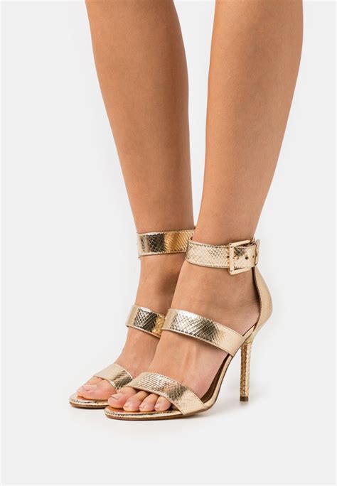 pale gold michael kors shoes|michael kors gold boots.